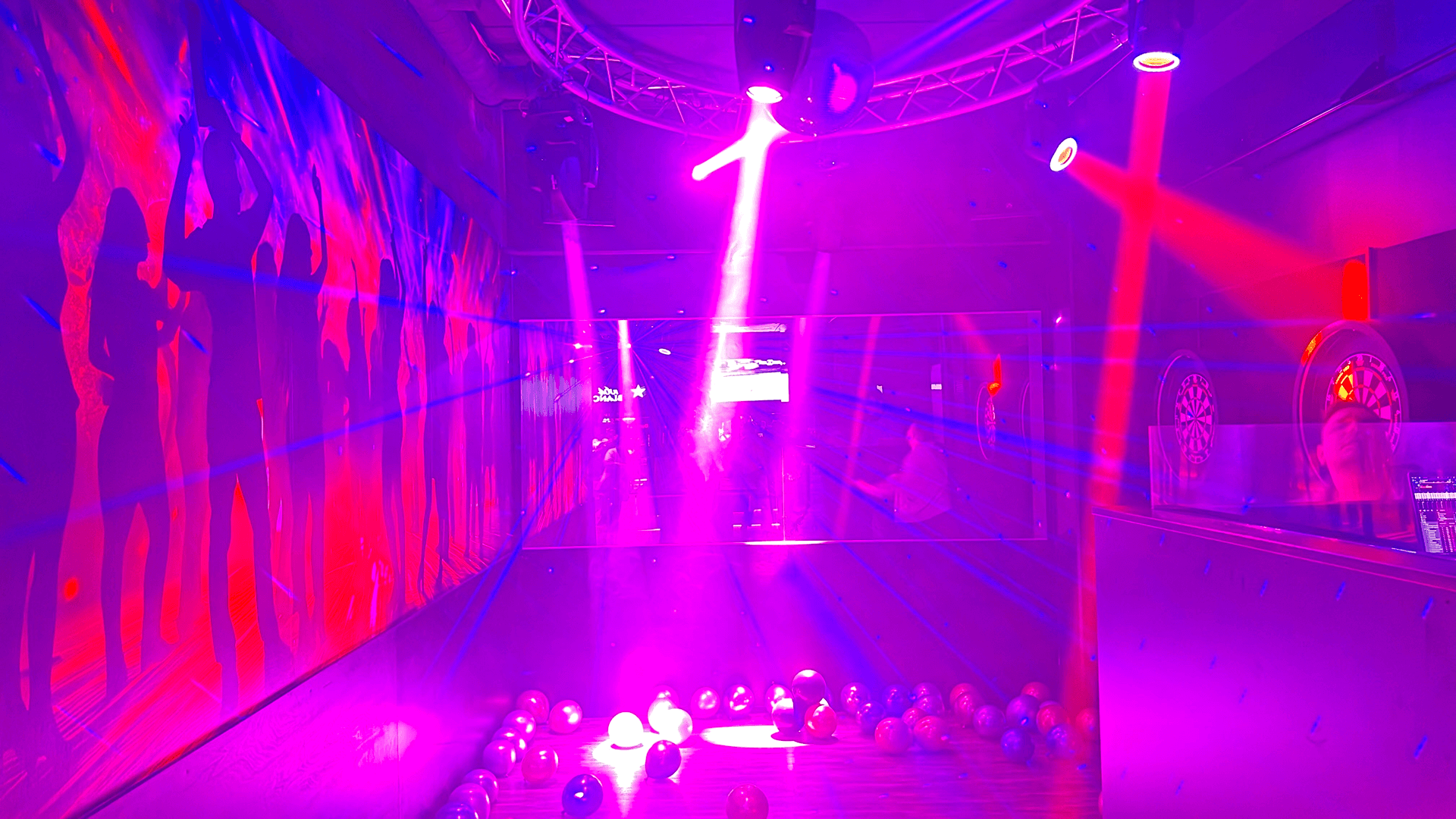 Nightclub dance floor with lights and crowd